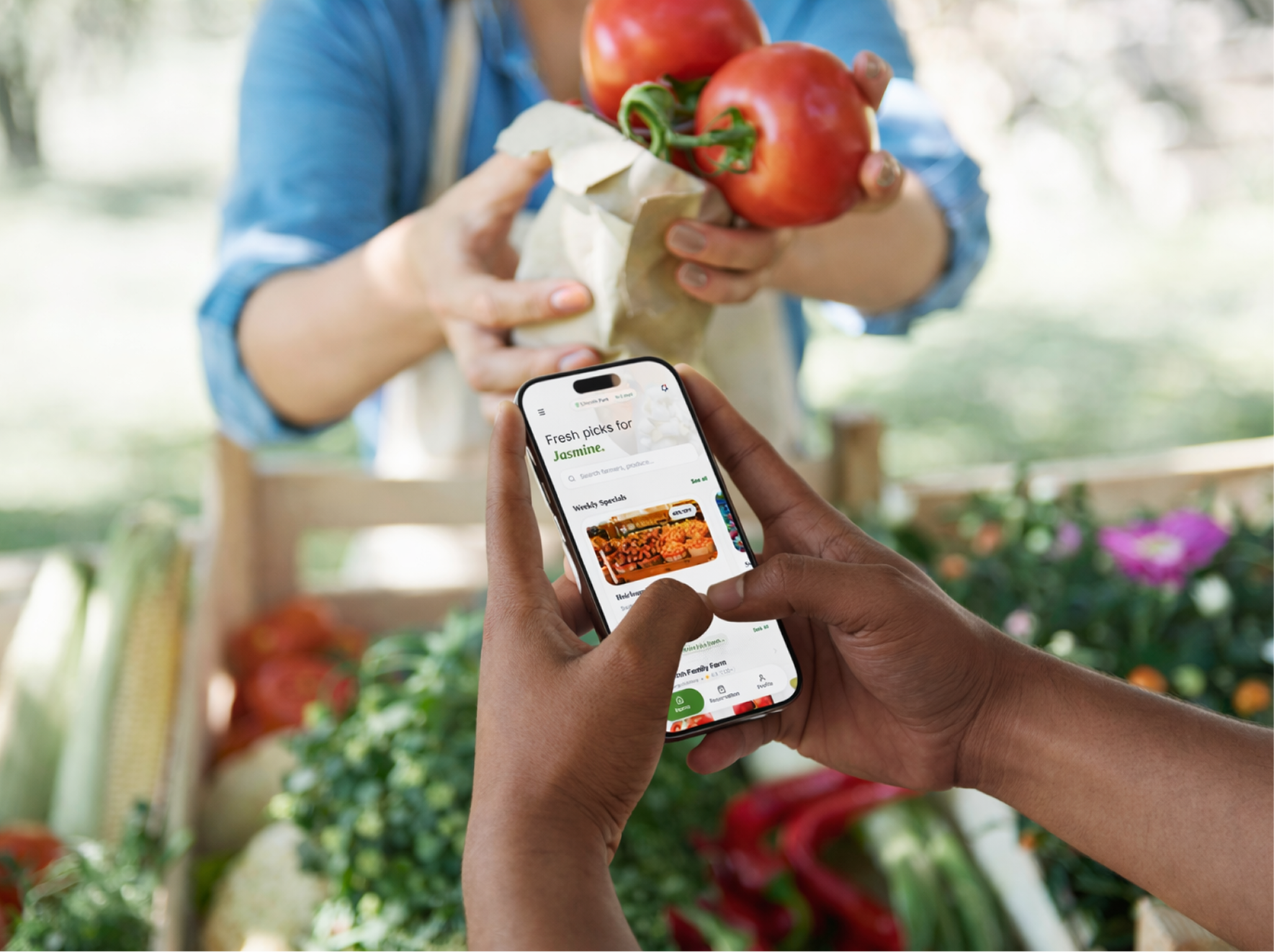 Customer using MintMarket while receiving fresh produce
